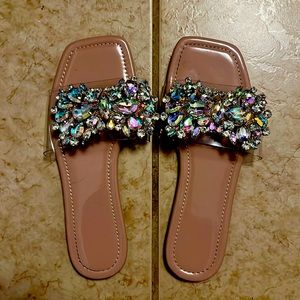Brand new Sandals w/ box. Only worn once. The sandals are very shimmery.